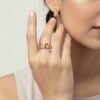22K gold leaf link finger ring worn on hand